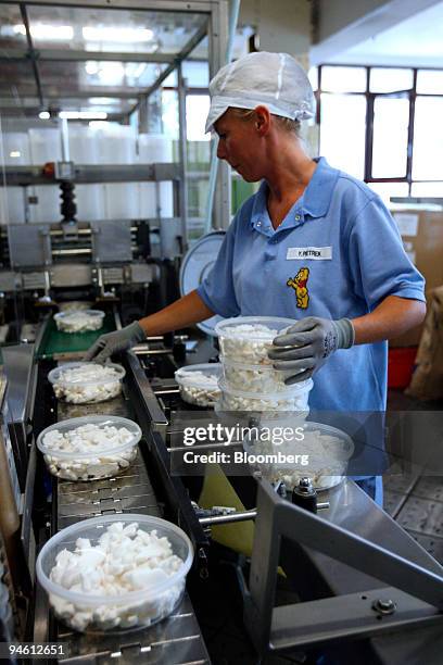 Haribo employee Yvonne Pietrek performs a quality control check on Knuddel-Knut'sch gummi candy, shaped like Knut, the baby polar bear abandoned by...