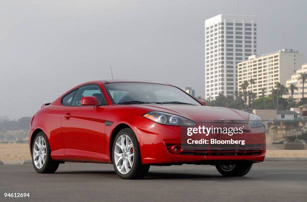 The 2007 Hyundai Tiburon poses at Beach, following its introduction to the motoring press, in Santa Monica, California, on Wednesday, October 25,...