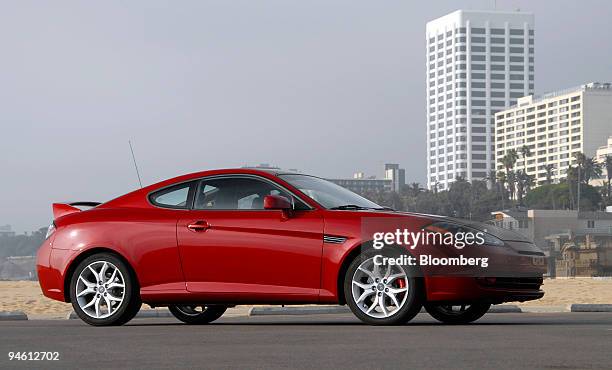 The 2007 Hyundai Tiburon poses at Beach, following its introduction to the motoring press, in Santa Monica, California, on Wednesday, October 25,...