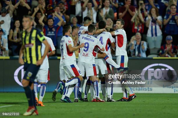 Jets players celebrate their eighth goal during the round 27 A-League match between the Central Coast Mariners and the Newcastle Jets at Central...