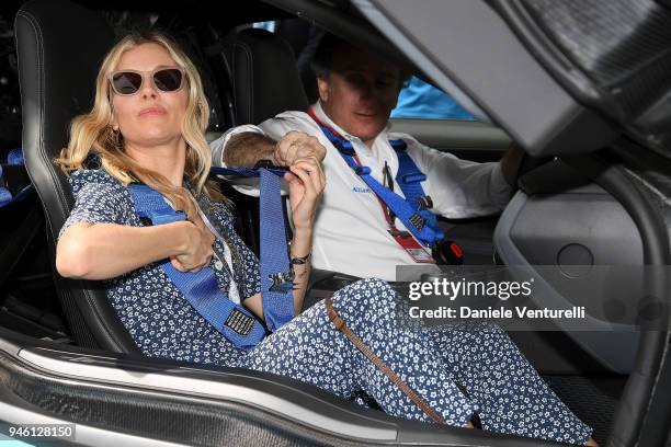 Sienna Miller and Alejandro Agag attend Rome E-Prix on April 14, 2018 in Rome, Italy.