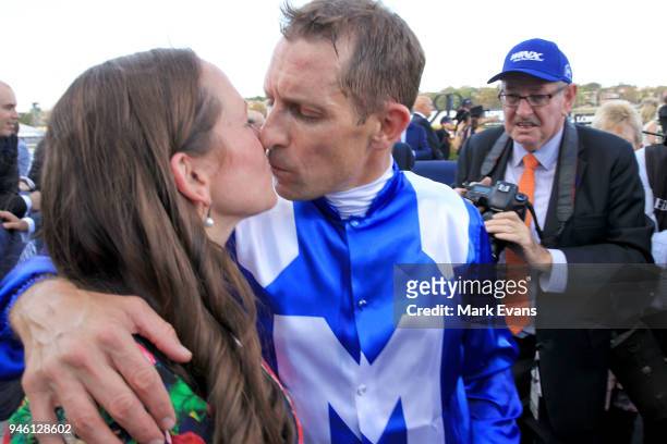 Hugh Bowman kisses wife Christine after winning race 7 The Queen Elizabeth Stakes during day two of The Championships as part of Sydney Racing at...