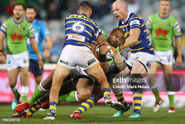 Junior Paulo of the Raiders is tackled during the round six NRL match between the Canberra Raiders and the Parramatta Eels at GIO Stadium on April...