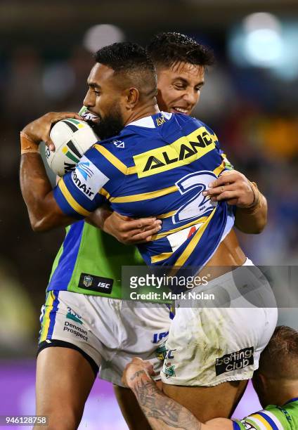 George Jennings of the Eels is tackled during the round six NRL match between the Canberra Raiders and the Parramatta Eels at GIO Stadium on April...