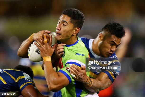 Mafoa'aeata Hingano of the Raiders is tackled during the round six NRL match between the Canberra Raiders and the Parramatta Eels at GIO Stadium on...
