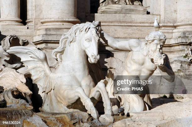 Italy, Rome. Trevi Fountain. Baroque. Designed by Nicola Salvi and completed by Pietro Bracci. 1762. Two tritons guide the carriage of Neptune,...