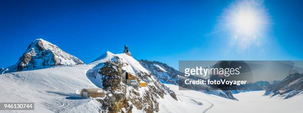 alps snowy sunburst over jungfraujoch mountain peaks panorama switzerland - jungfraujoch stock pictures, royalty-free photos & images