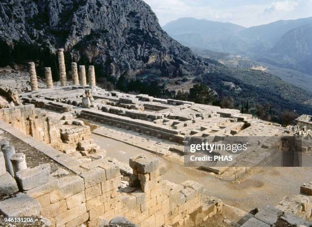 Greece. Delphi. Ancient sanctuarly. Ruins of the ancient Temple of Apollo, 4th century BC. Doric style. Valley of Phocis.