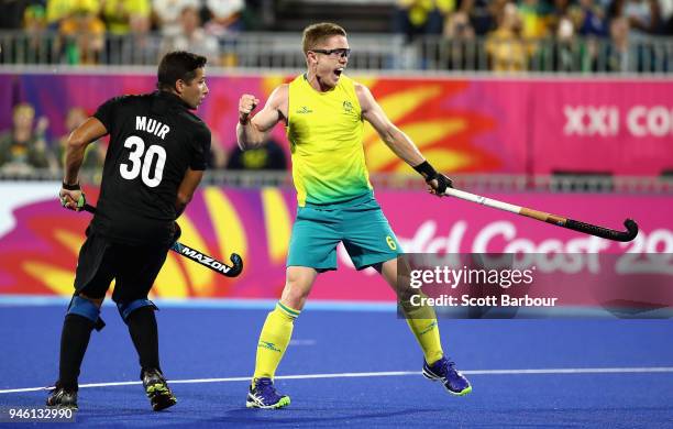 Matthew Dawson of Australia celebrates scoring his second goal in the Men's gold medal match between Australia and New Zealand during Hockey on day...