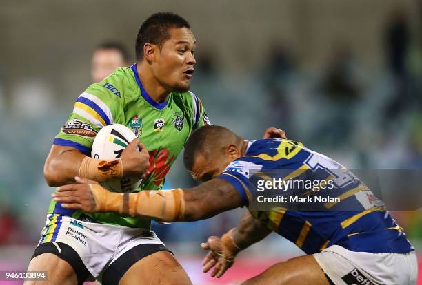 Joseph Leilua of the Raiders is tackled during the round six NRL match between the Canberra Raiders and the Parramatta Eels at GIO Stadium on April...