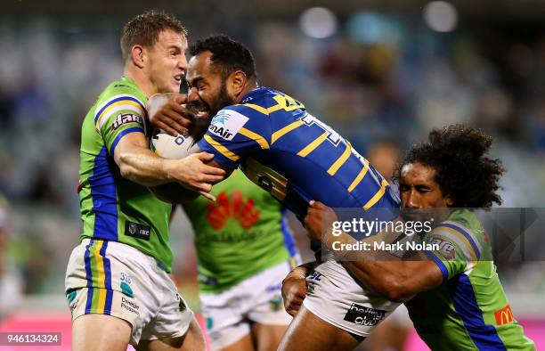 Tony Williams of the Eels is tackled during the round six NRL match between the Canberra Raiders and the Parramatta Eels at GIO Stadium on April 14,...