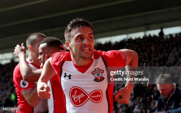 Dusan Tadic of Southampton celebrates after opening the scoring during the Premier League match between Southampton and Chelsea at St Mary's Stadium...