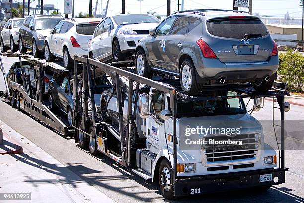 Nissan Motor Co. Vehicles are carted off from the Vehicles Services America Inc. Lot in San Pedro, California, U.S., Tuesday, Sept. 4, 2007. Nissan...