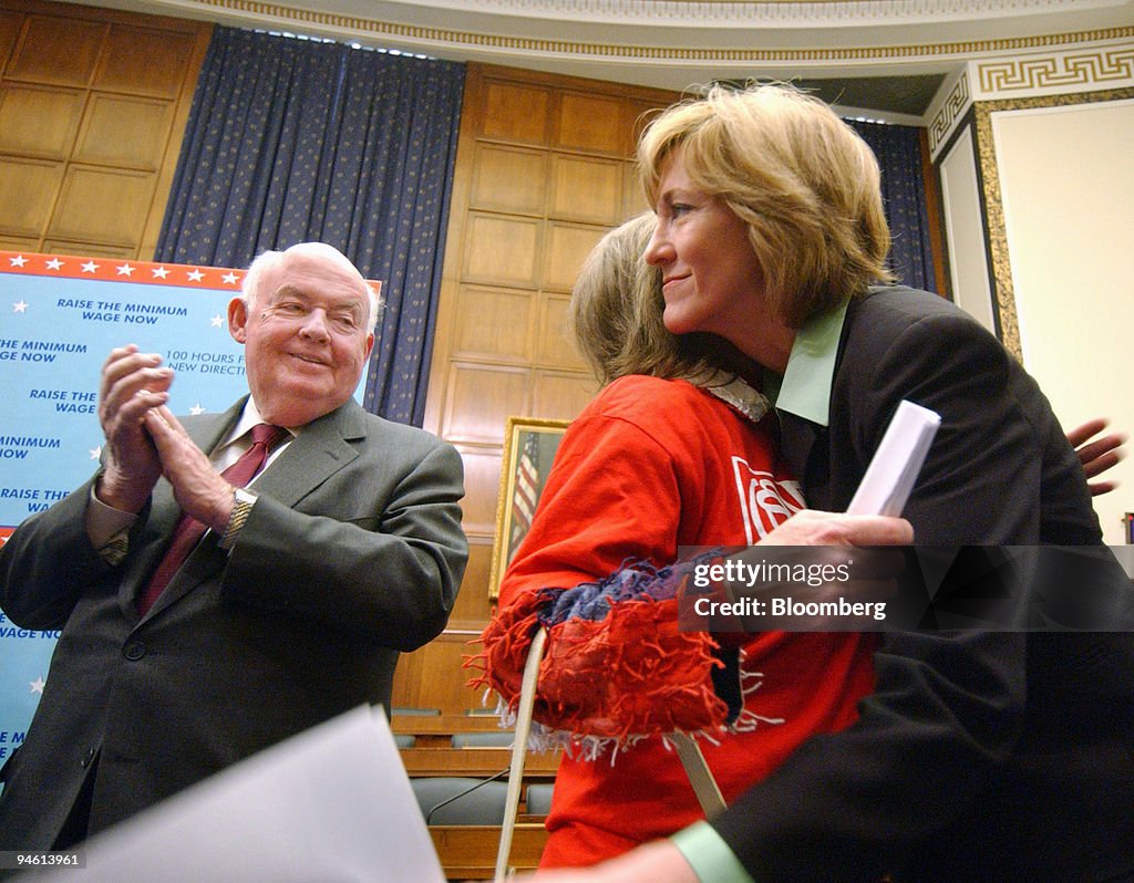 California Representative Betty Sutton, right hugs Gina Walt