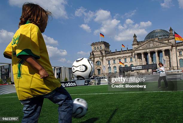 Children play with "+Teamgeist," the official World Cup soccer ball, at "Adidas World of Football," a temporary promotional park for the 2006 World...