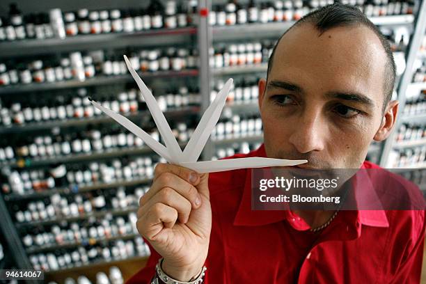 Christophe Laudamiel, perfumer, smells samples of perfume in his laboratory in Berlin, Germany, on Friday, Dec. 28, 2007. Laudamiel will be giving...