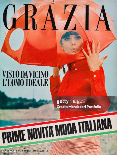 Cover of the women's magazine Grazia. A very original idea per the sun and the summer rain: vynil umbrella with plexiglas porthole. July 1966