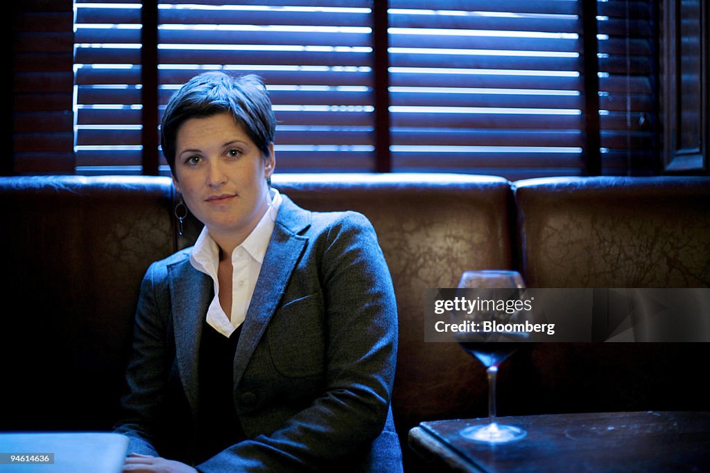 Phoebe Damrosch, author of "Service Included," poses in a Ne