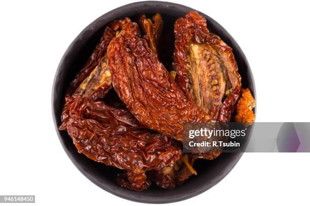 dried tomatoes in stone bowl - 2015 375 stock pictures, royalty-free photos & images