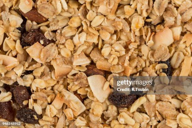 pile of muesli cereal - raisin bran stock pictures, royalty-free photos & images