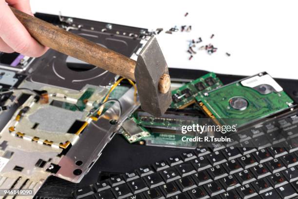 Hammer Smashed Computer Old Broken Laptop Photos and Premium High Res Pictures - Getty Images
