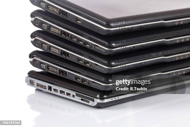 Old Pc Stack Stack Of Old Laptops Photos and Premium High Res Pictures - Getty Images