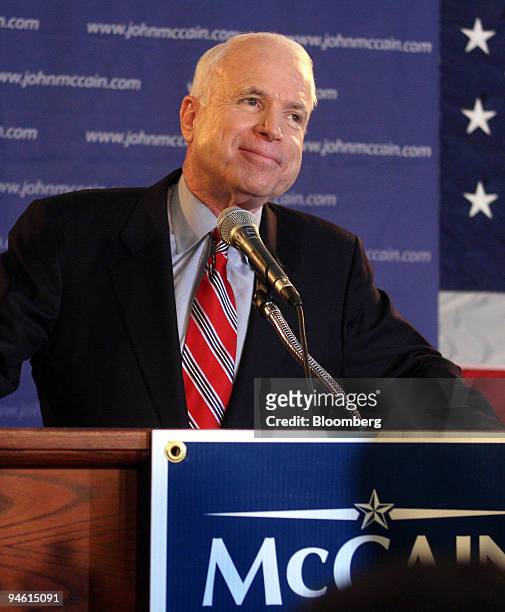 John McCain, U.S. Senator from Arizona and 2008 Republican presidential candidate, speaks to supporters at a primary night rally in Nashua, New...