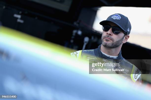 Jimmie Johnson, driver of the Lowe's for Pros Chevrolet, gets into his car during practice for the Monster Energy NASCAR Cup Series Food City 500 at...