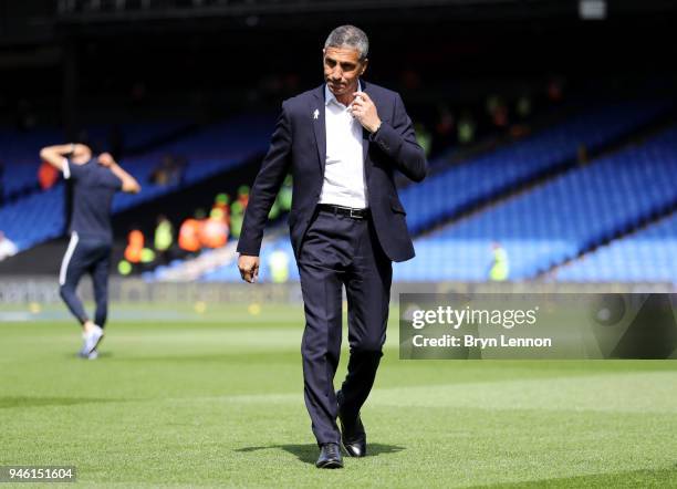 Chris Hughton, Manager of Brighton and Hove Albion inspect the pitch prior to the Premier League match between Crystal Palace and Brighton and Hove...