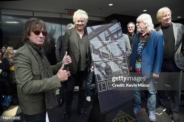 Inductees Richie Sambora, John Lodge, David Bryan, Graeme Edge and Justin Hayward attend the Rock and Roll Hall of Fame and Museum on April 13, 2018...