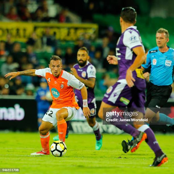 Eric Bautheac of the Brisbane Roar controls the ball through the midfield during the round 27 A-League match between the Perth Glory and the Brisbane...