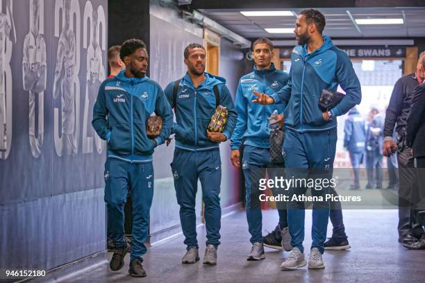 Nathan Dyer, Wayne Routledge, Kyle Naughton and Kyle Bartley of Swansea City arrive prior to the game during the Premier League match between Swansea...