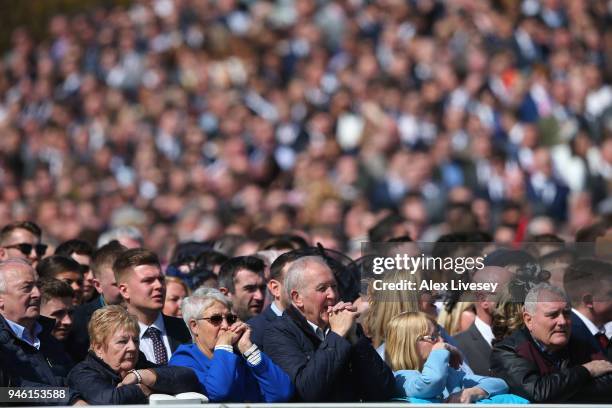 Crowds watch the Gaskells Handicap Hurdle Race at Aintree Racecourse on April 14, 2018 in Liverpool, England.