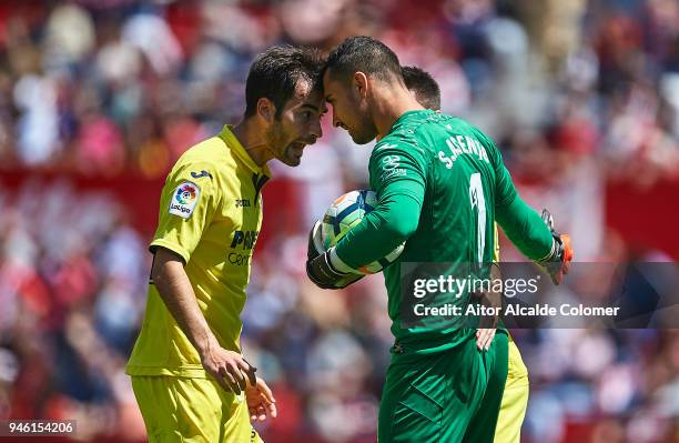 Sergio Asenjo of Villarreal CF celebrates after saving a penalti with his team mate Manuel Trigueros of Villarreal CF during the La Liga match...