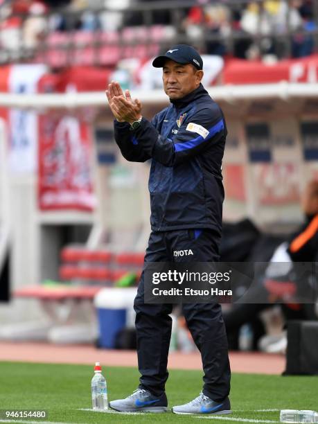 Head coach Yahiro Kazama of Nagoya Grampus looks on during the J.League J1 match between Kashima Antlers and Nagoya Grampus at Kashima Soccer Stadium...