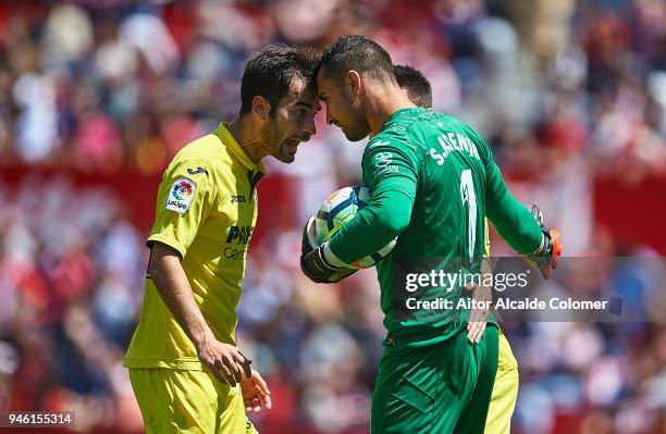 Sergio Asenjo of Villarreal CF celebrates after saving a penalti with his team mate Manuel Trigueros of Villarreal CF during the La Liga match...