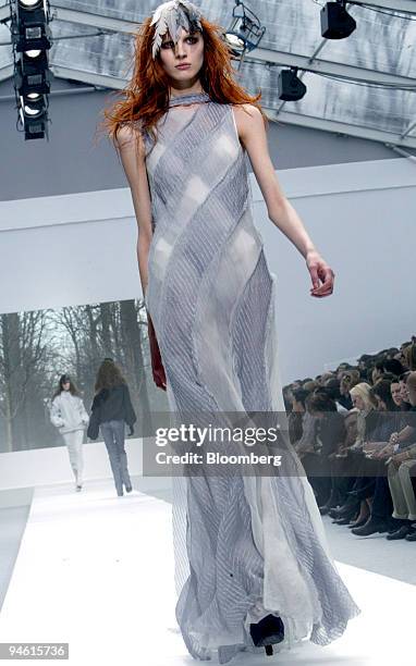 Model wears an outfit by Belgian fashion designer Olivier Theyskens during the presentation of his Fall/Winter 2007-2008 ready-to-wear collection for...