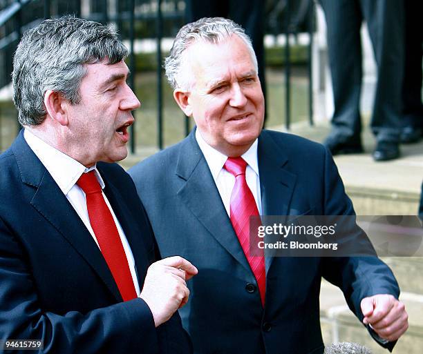 Chancellor of the Exchequer, Gordon Brown, left, and Minister for Northern Ireland, Peter Hain speak to the media outside the Scottish Office after...
