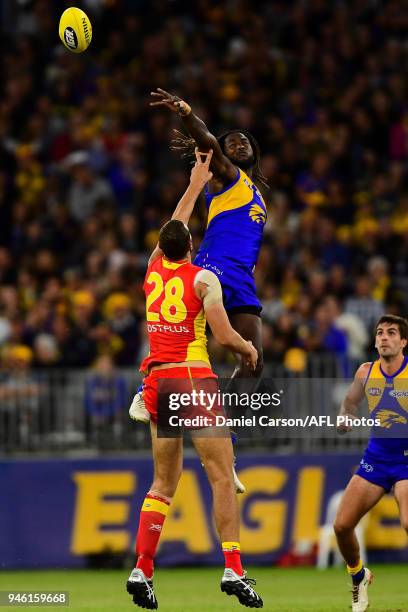 Nic Naitanui of the Eagles contests a ruck with Jarrod Witts of the Suns during the 2018 AFL Round 04 match between the West Coast Eagles and the...