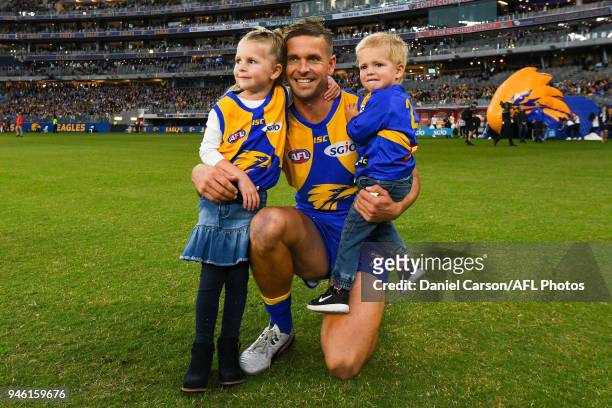 Mark LeCras of the Eagles takes his children onto the ground in his 200th game during the 2018 AFL Round 04 match between the West Coast Eagles and...
