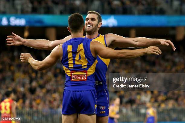 Liam Duggan and Jack Darling of the Eagles celebrate a goal during the round four AFL match between the West Coast Eagles and the Gold Coast Suns at...