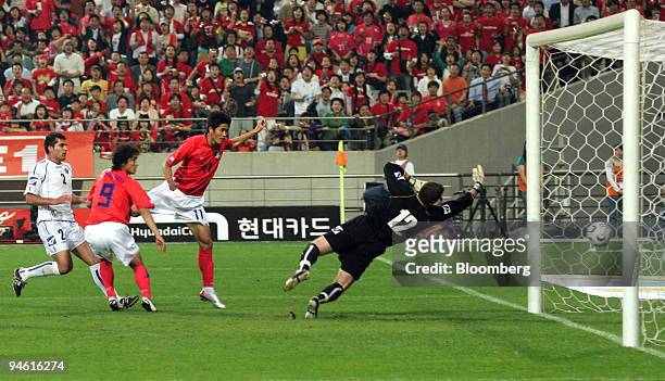 South Korean striker Seol Ki Hyeon scores first goal in 2-0 victory over Bosnia-Herzegovina after Bosnia keeper saved shot from Ahn Jung Hwan , in...