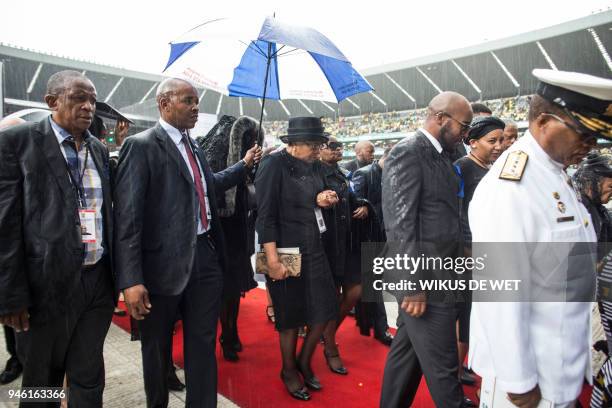 Graca Machel, widow of former President Nelson Mandela, leaves the funeral of Winnie Madikizela-Mandela at Orlando Stadium in Soweto, in Johannesburg...