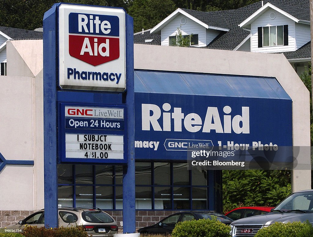 A sign stands outside a Rite-Aid pharmacy in Camp Hill, Penn