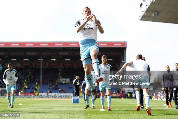 Chris Wood of Burnley warms up prior to the Premier League match between Burnley and Leicester City at Turf Moor on April 14, 2018 in Burnley,...