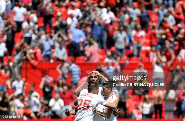 Sevilla's French midfielder Steven N'Zonzi celebrates a goal during the Spanish league footbal match between Sevilla FC and Villarreal CF at the...