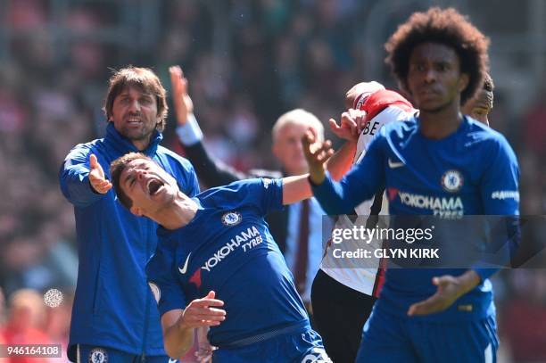 Chelsea's Italian head coach Antonio Conte and Chelsea's Brazilian midfielder Willian gesture as Chelsea's Spanish defender Cesar Azpilicueta reacts...