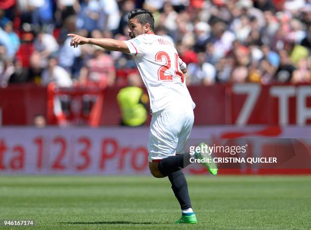 Sevilla's Spanish forward Nolito celebrates a goal during the Spanish league footbal match between Sevilla FC and Villarreal CF at the Ramon Sanchez...