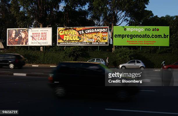 Traffic passes billboards on Indianapolis Avenue in Sao Paulo, Brazil, on May 2, 2007. Corporate logos are disappearing from the Sao Paulo skyline....
