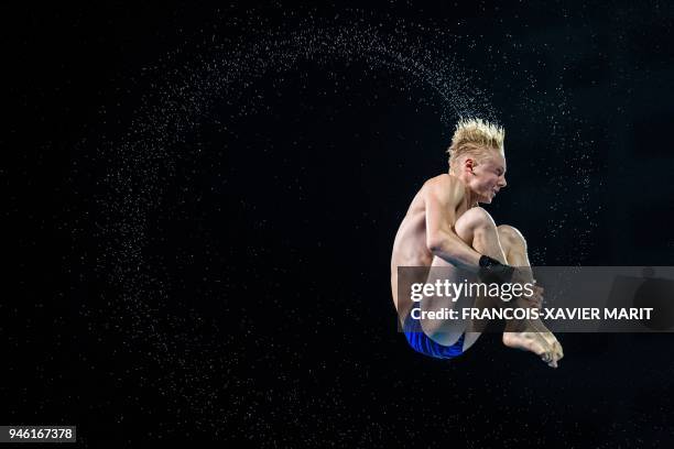 Scotland's Lucas Thomson competes during the diving men's 10m platform final during the 2018 Gold Coast Commonwealth Games at the Optus Aquatic...